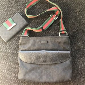 Authentic Gucci Black canvas with signature strap